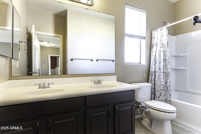 full bathroom with shower / tub combo with curtain, tile patterned floors, toilet, and vanity