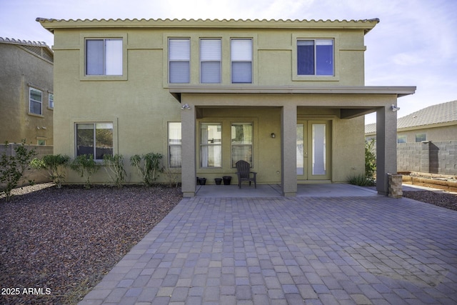 rear view of property with a patio