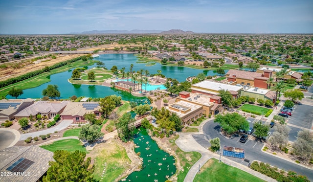 aerial view with a water view and a residential view