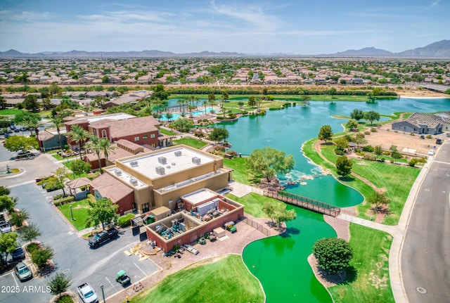 aerial view with a residential view and a water and mountain view