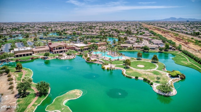 drone / aerial view with a residential view and a water view