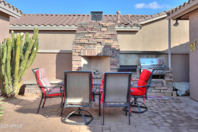 view of patio with area for grilling