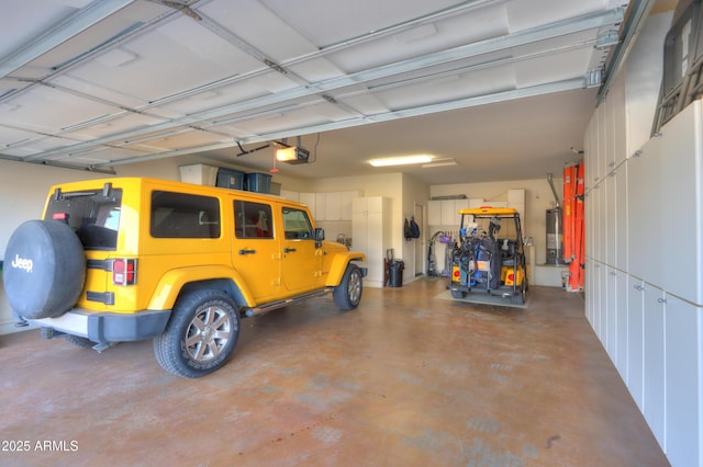 garage with a garage door opener, gas water heater, and a carport