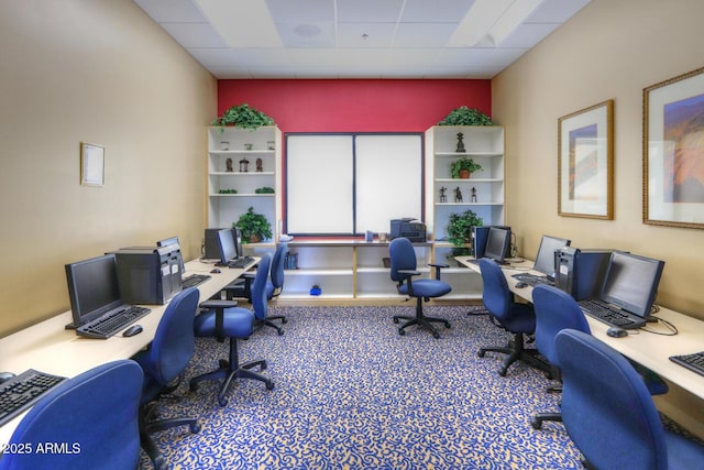 office featuring a paneled ceiling