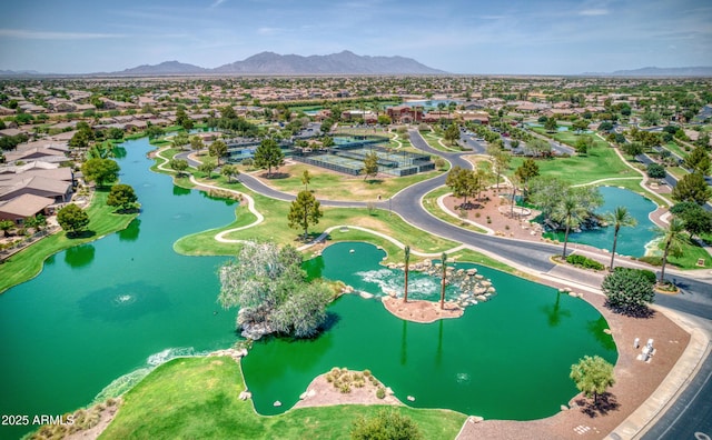 bird's eye view with a water and mountain view