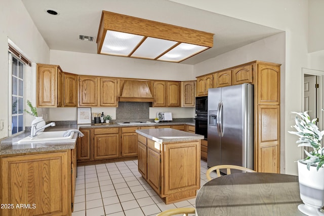 9 E Los Arboles Cir, Tempe, AZ 85284 - kitchen featuring black appliances, a sink, a kitchen island, light tile patterned floors, and premium range hood