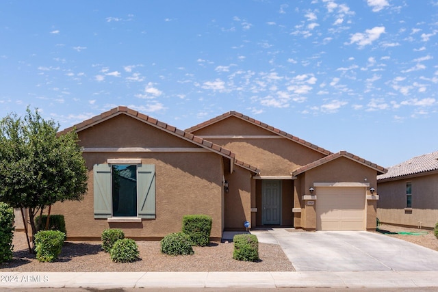 view of front of home with a garage