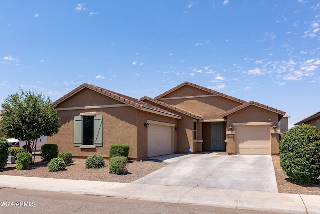 single story home with a garage