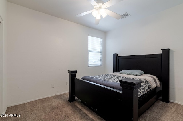 bedroom with ceiling fan and carpet floors