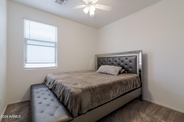 bedroom with carpet, multiple windows, and ceiling fan