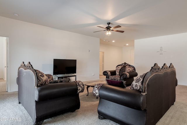 living room with ceiling fan and carpet floors