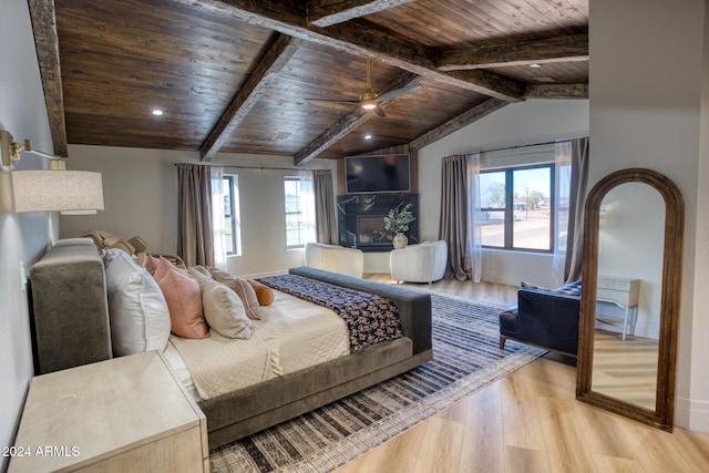830 E Maverick, Taylor, AZ 85939 - bedroom featuring lofted ceiling with beams, wood ceiling, light hardwood / wood-style flooring, and multiple windows