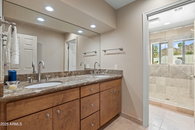 3033 E Claremont Ave, Phoenix, AZ 85016 - full bath with a shower stall, double vanity, a sink, and tile patterned flooring