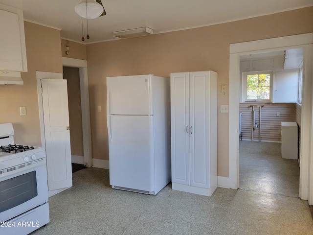 11 Black Knob Vw, Bisbee, AZ 85603 - kitchen with white appliances, under cabinet range hood, baseboards, ornamental molding, and light floors