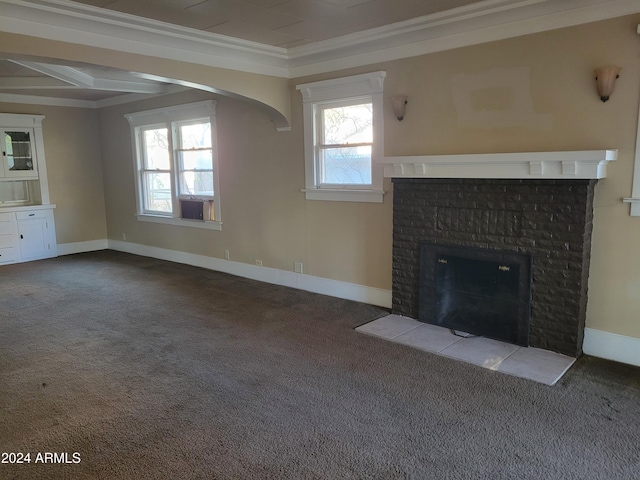 11 Black Knob Vw, Bisbee, AZ 85603 - unfurnished living room with crown molding, carpet floors, plenty of natural light, baseboards, and beamed ceiling
