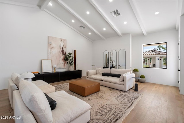 10541 E Windrose Dr, Scottsdale, AZ 85259 - living room featuring beamed ceiling, light wood-type flooring, visible vents, and recessed lighting