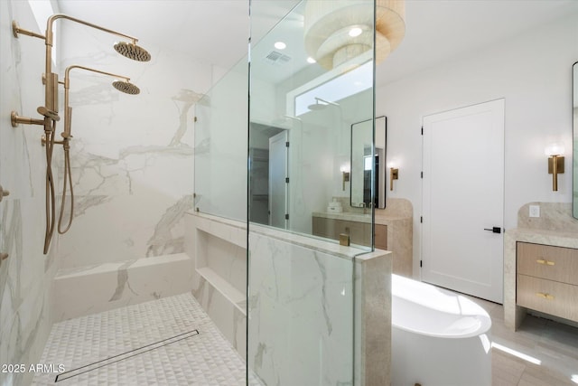 10541 E Windrose Dr, Scottsdale, AZ 85259 - bathroom with visible vents, a freestanding bath, vanity, and a marble finish shower