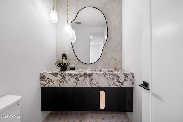 10541 E Windrose Dr, Scottsdale, AZ 85259 - bathroom with toilet, visible vents, and vanity