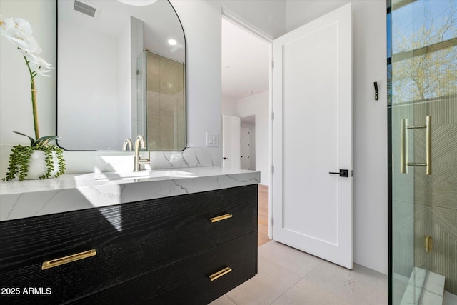 10541 E Windrose Dr, Scottsdale, AZ 85259 - bathroom featuring a stall shower, visible vents, and vanity