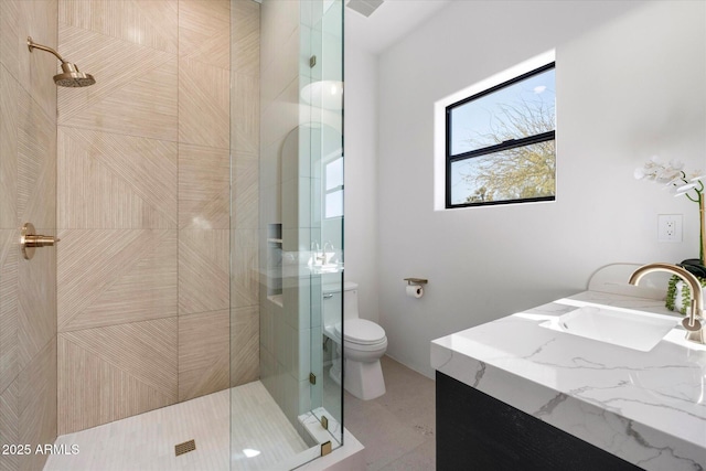 10541 E Windrose Dr, Scottsdale, AZ 85259 - full bath featuring toilet, a tile shower, and vanity