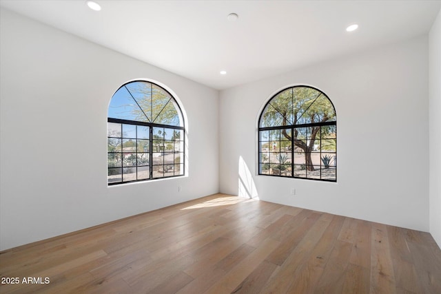 10541 E Windrose Dr, Scottsdale, AZ 85259 - empty room featuring light wood finished floors and recessed lighting