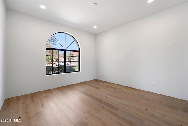 10541 E Windrose Dr, Scottsdale, AZ 85259 - empty room featuring light wood finished floors and recessed lighting