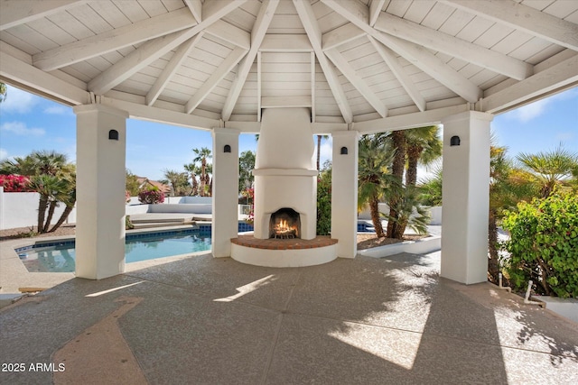 10541 E Windrose Dr, Scottsdale, AZ 85259 - view of patio with a large fireplace and a gazebo
