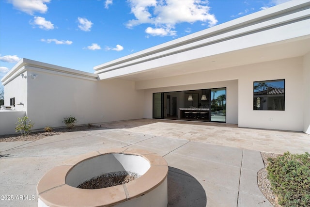 10541 E Windrose Dr, Scottsdale, AZ 85259 - view of patio featuring a fire pit
