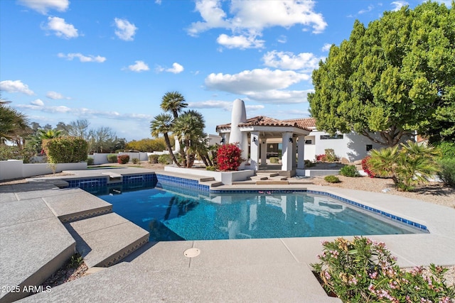 10541 E Windrose Dr, Scottsdale, AZ 85259 - outdoor pool with an outbuilding, a patio, and a storage structure