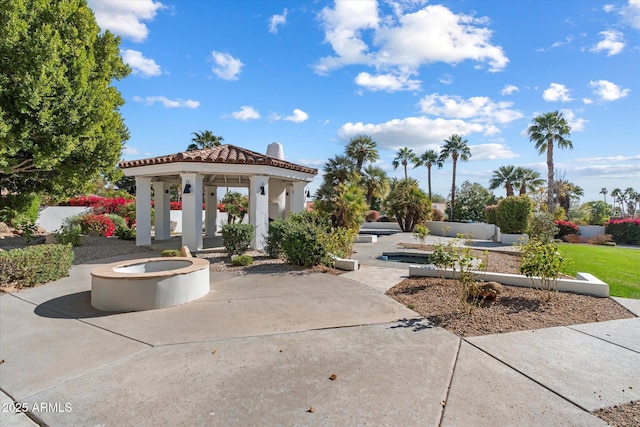 10541 E Windrose Dr, Scottsdale, AZ 85259 - view of property's community with a patio, a fire pit, and a gazebo