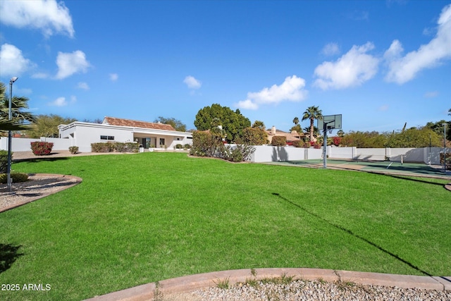 10541 E Windrose Dr, Scottsdale, AZ 85259 - view of yard featuring fence and basketball hoop