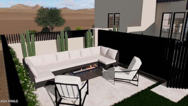 view of patio featuring an outdoor living space with a fire pit