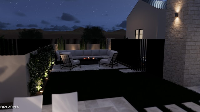 patio at twilight with outdoor lounge area