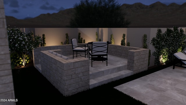 view of patio at night