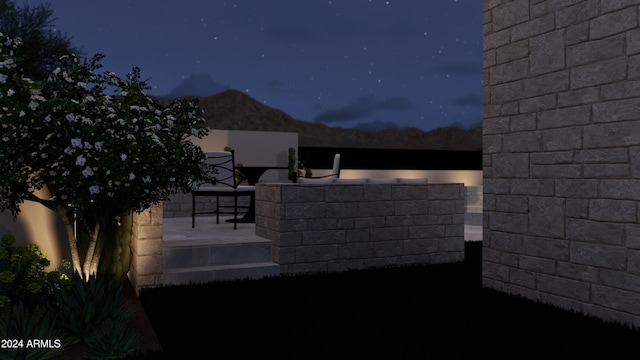 view of patio at night