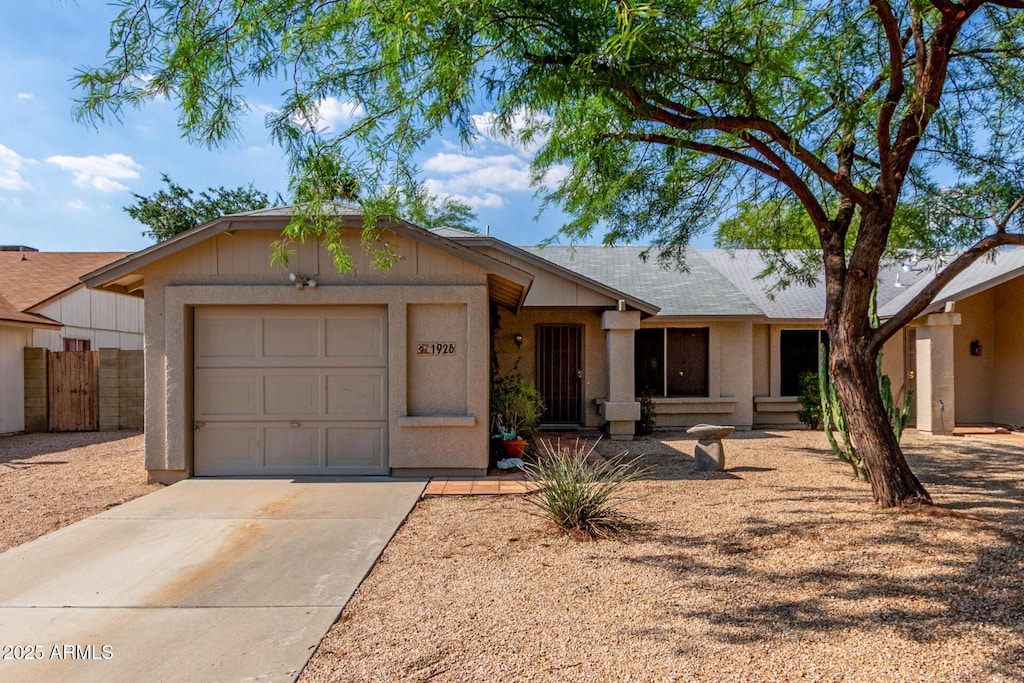 1926 E Sandra Ter, Phoenix, AZ 85022 - ranch-style house with driveway, an attached garage, and a shingled roof