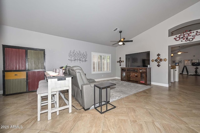 1623 E Runion Dr, Phoenix, AZ 85024 - living room featuring a ceiling fan, baseboards, and high vaulted ceiling
