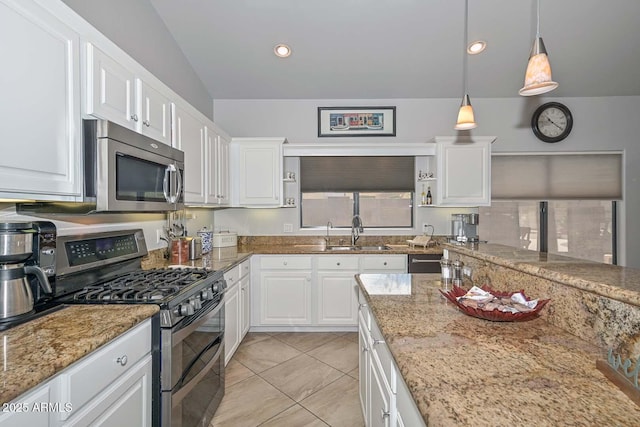 1623 E Runion Dr, Phoenix, AZ 85024 - kitchen with appliances with stainless steel finishes, a sink, white cabinetry, light stone counters, and vaulted ceiling
