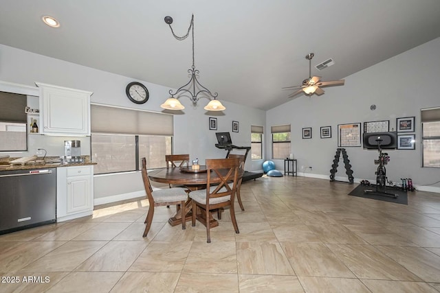 1623 E Runion Dr, Phoenix, AZ 85024 - dining area featuring ceiling fan, baseboards, and high vaulted ceiling