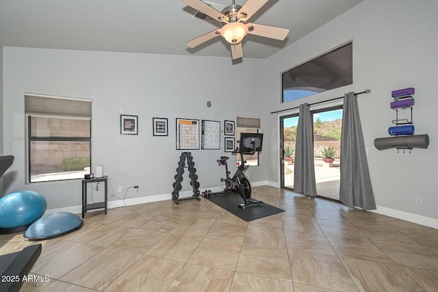 1623 E Runion Dr, Phoenix, AZ 85024 - exercise room featuring baseboards, ceiling fan, and a high ceiling