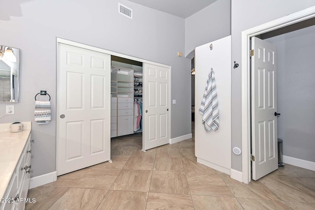 1623 E Runion Dr, Phoenix, AZ 85024 - full bath featuring vanity, baseboards, and a spacious closet