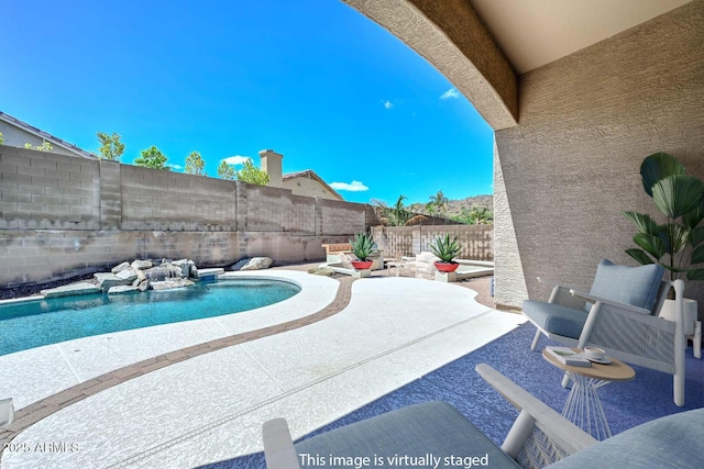1623 E Runion Dr, Phoenix, AZ 85024 - view of swimming pool with a fenced backyard and a patio
