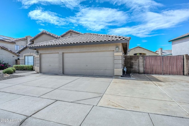 1623 E Runion Dr, Phoenix, AZ 85024 - view of front of home featuring concrete driveway, a garage, a tile roof, and stucco siding
