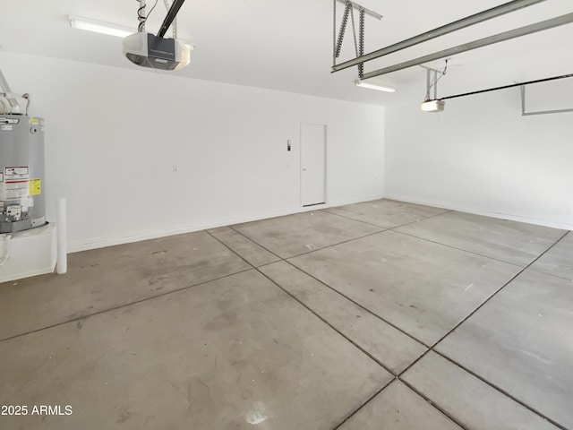 garage with a garage door opener and water heater