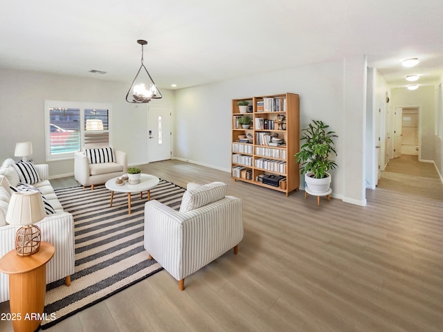 living room with light hardwood / wood-style floors