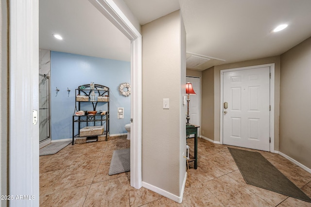 10030 W Indian School Rd Unit 101, Phoenix, AZ 85037 - foyer featuring light tile patterned flooring and recessed lighting