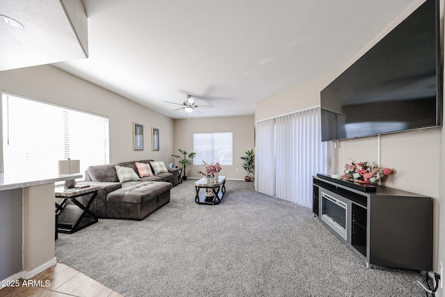 10030 W Indian School Rd Unit 101, Phoenix, AZ 85037 - living area featuring carpet floors and ceiling fan