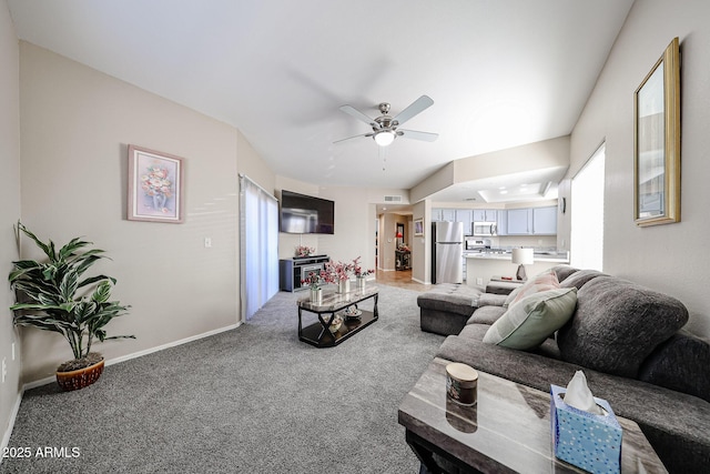 10030 W Indian School Rd Unit 101, Phoenix, AZ 85037 - living area with ceiling fan and light colored carpet