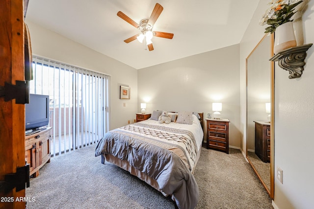 10030 W Indian School Rd Unit 101, Phoenix, AZ 85037 - bedroom featuring carpet floors, access to exterior, and a ceiling fan