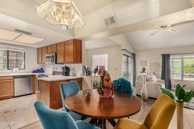 839 S Westwood Unit 287, Mesa, AZ 85210 - dining area featuring vaulted ceiling, ceiling fan, and a chandelier